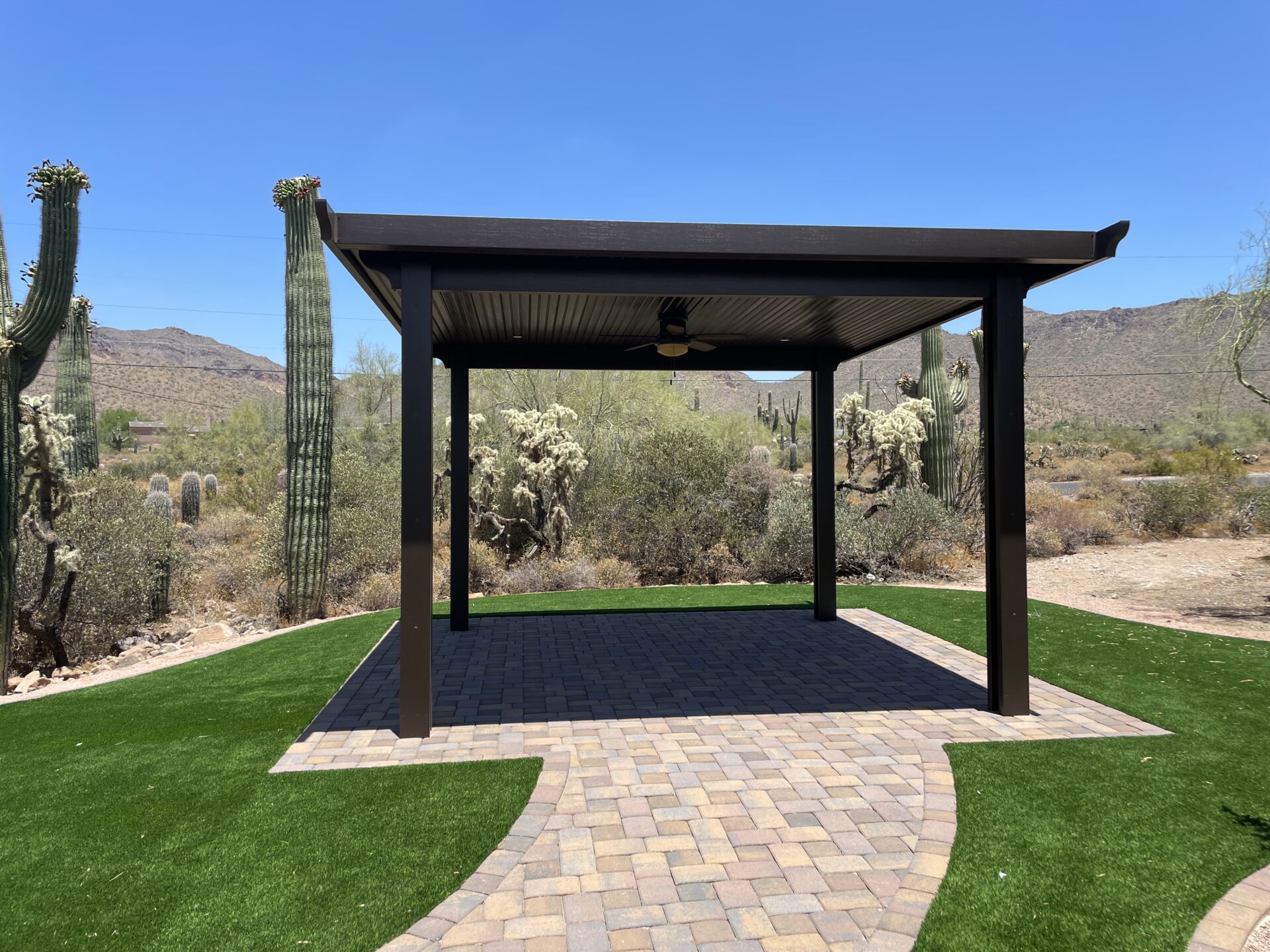 Smart Backyard Upgrade Ideas: Pairing Pavers, Turf, and Patio Covers