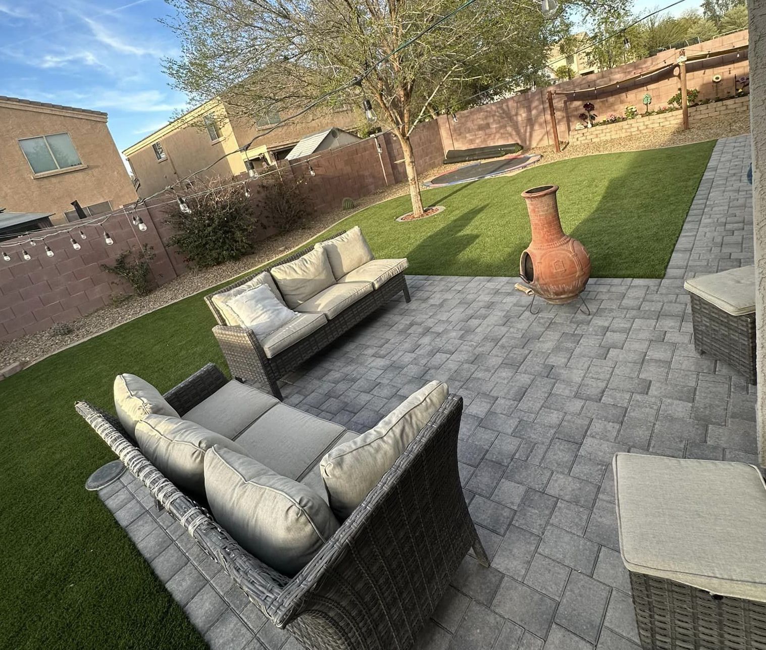 Fall Backyard Ideas: How Pavers and Artificial Turf Elevate Your Outdoor Living