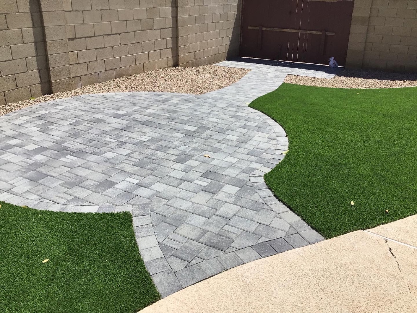 Paver patio and walkway install on an Arizona job site by Green Forever Arizona